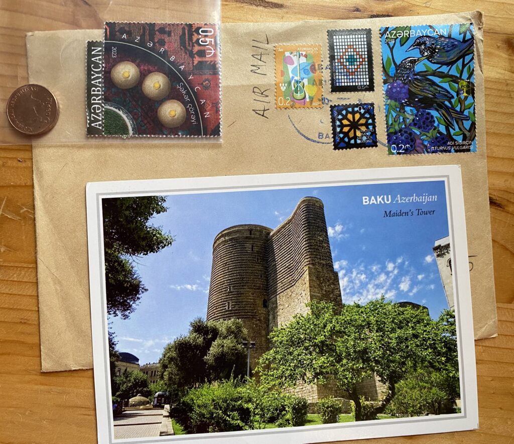 Postcard from Azerbaijan, along with a cover, stamp, and coin, received Jun 6, 2023.